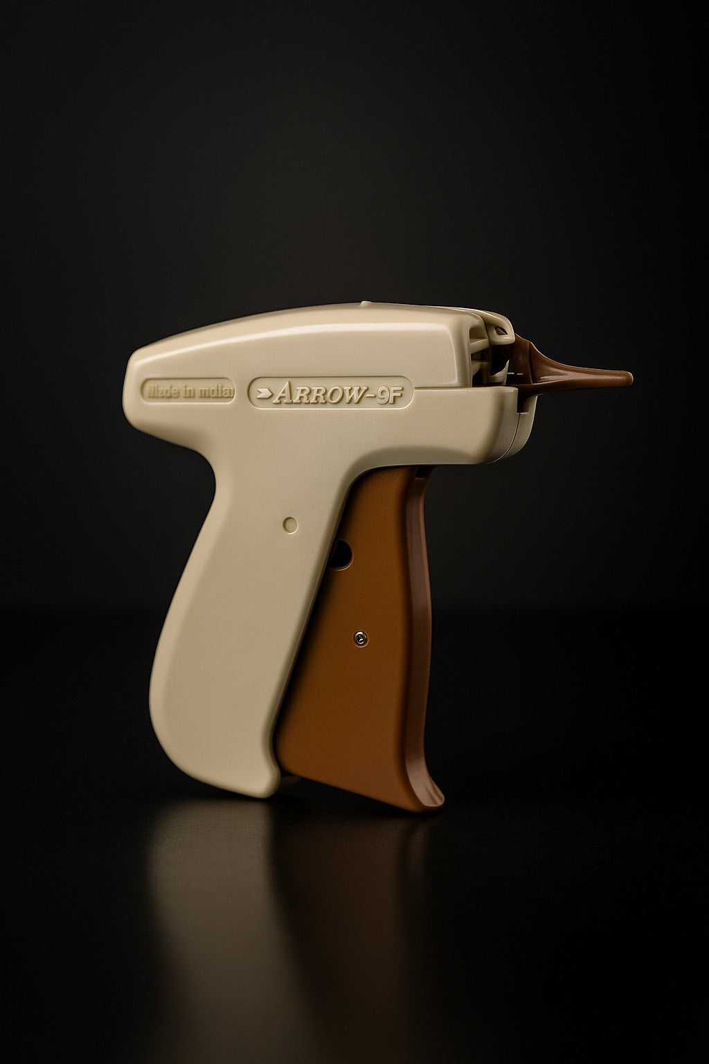 side view of arrow 9f mark ii fine tag gun in beige brown color trusted by paras packing

