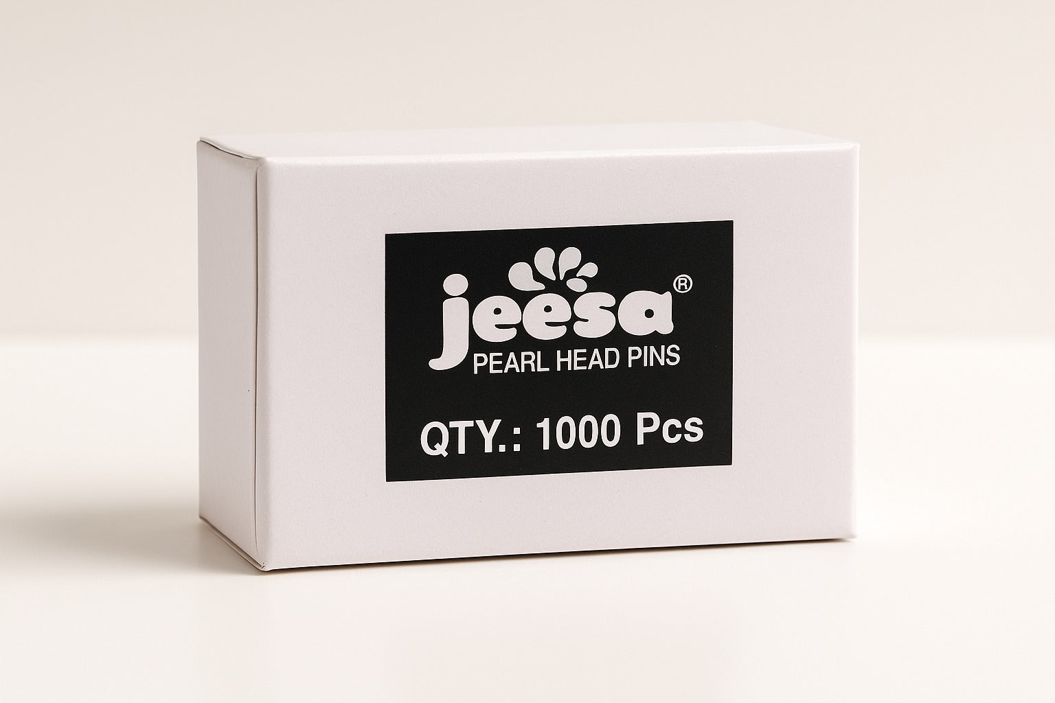 white closed box of jeesa pearl head pins with qty 1000 pcs written on label
