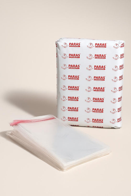clear double tape poly bags – 22 micron with red paras packing branding on master pack
